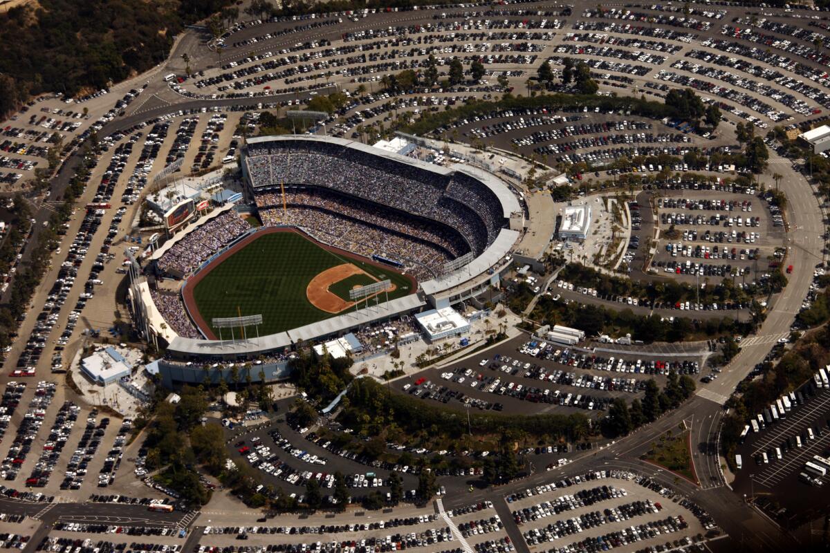 The last time the All-Star game was played at Dodger Stadium was in 1980. Above, the stadium on opening day last year.