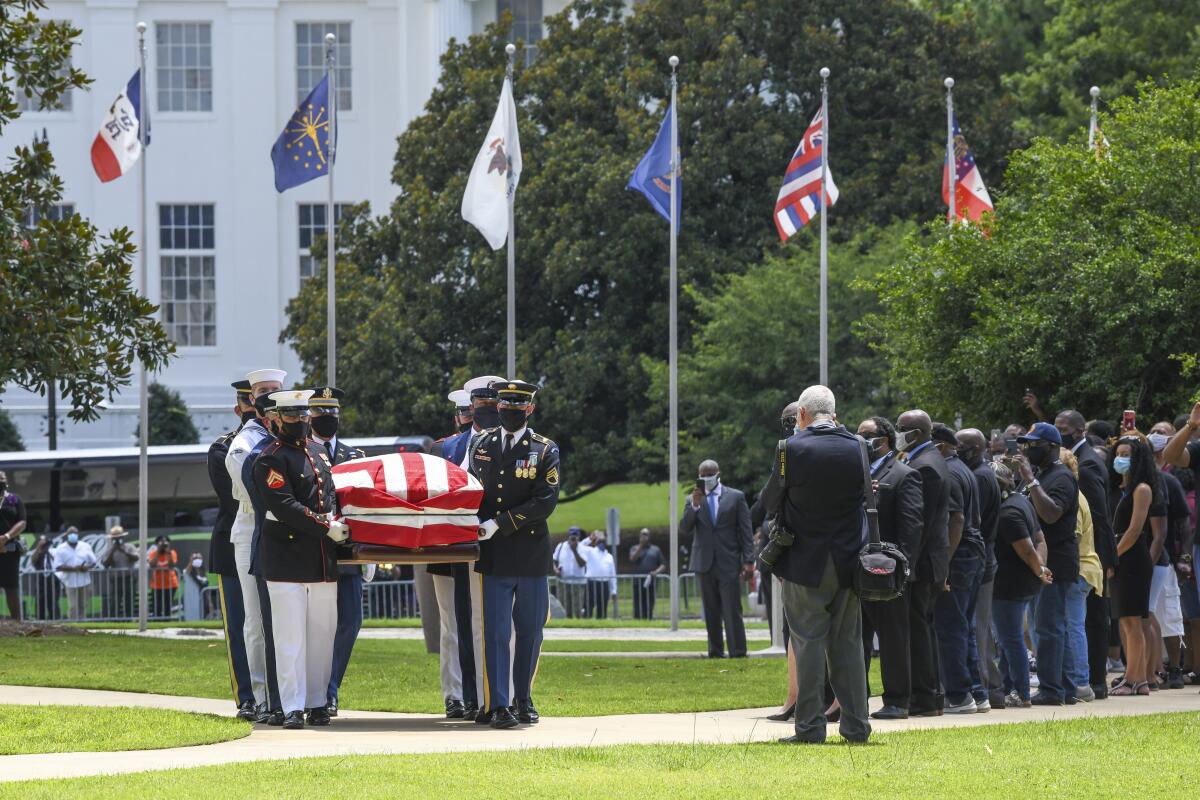 The body of Congressman John Lewis arrives at the Alabama Capitol.