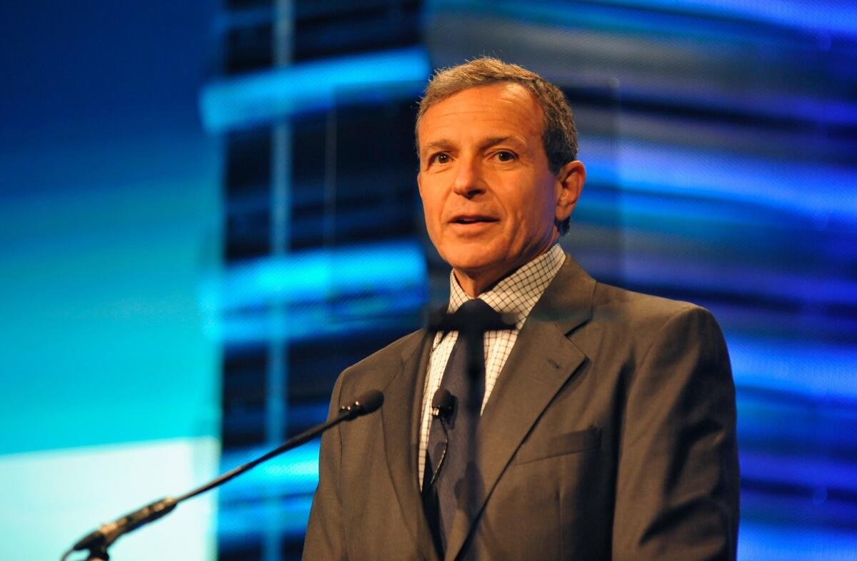 Walt Disney Co. Chief Executive Bob Iger accepts the 2013 John Wooden Global Leadership Award during a ceremony hosted by the UCLA Anderson School of Management at the Beverly Hilton hotel.