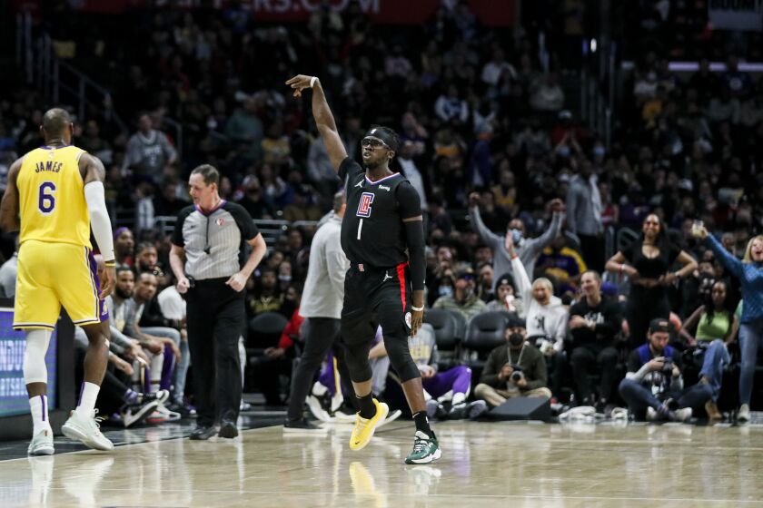 Los Angeles, CA - March 03: LA Clippers guard Reggie Jackson (1) celebrates after making a shot during the second half against the Los Angeles Lakers at Crypto.com on Thursday, March 3, 2022 in Los Angeles, CA.(Robert Gauthier / Los Angeles Times)