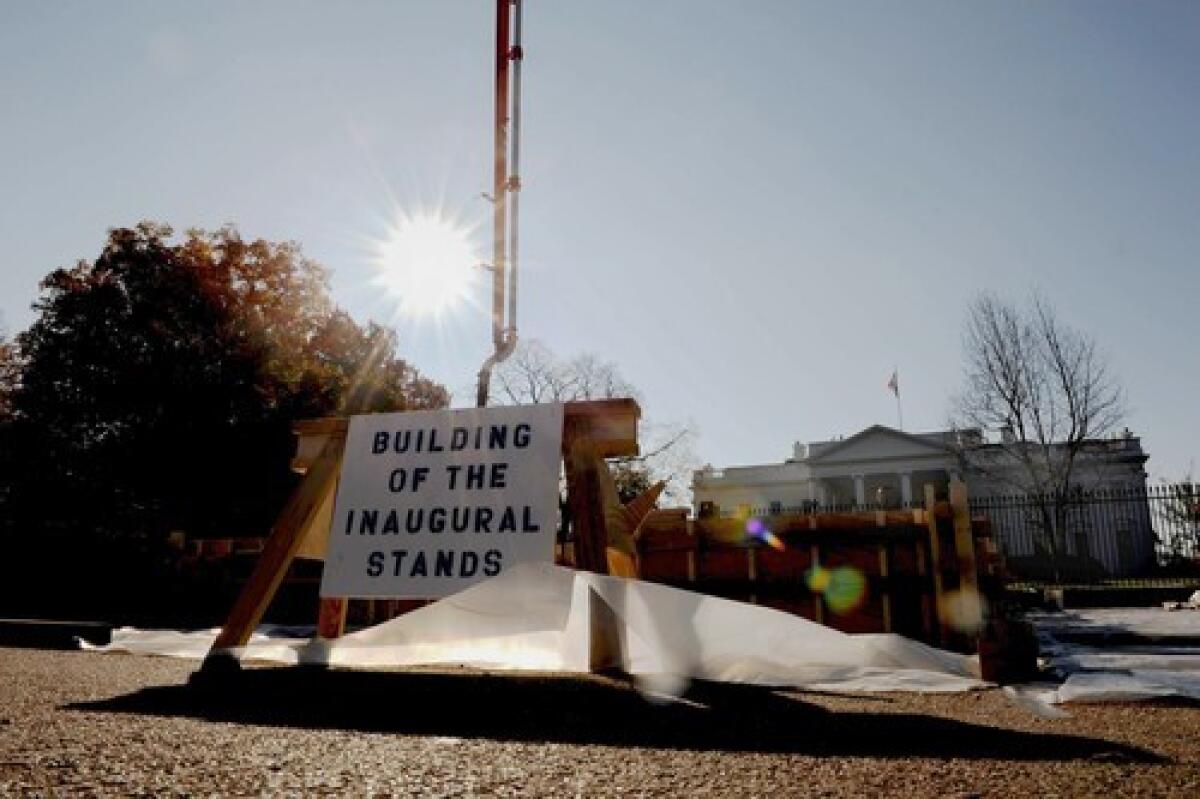 Foundations are laid for bomb-resistant stands in front of the White House for the swearing-in of Barack Obama as president.