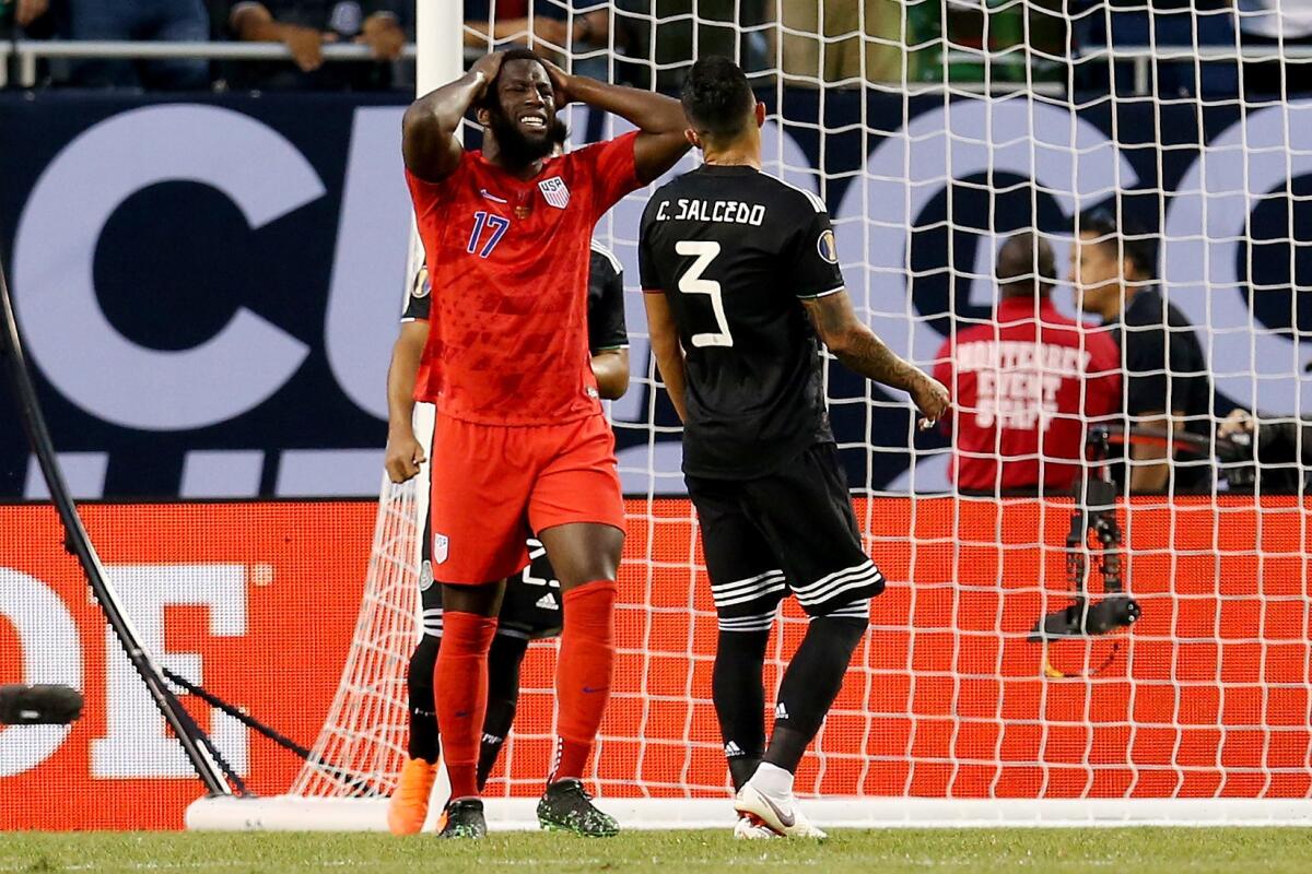 U.S. striker Jozy Altidore reacts after missing a shot against Mexico in the Gold Cup final on July 7.