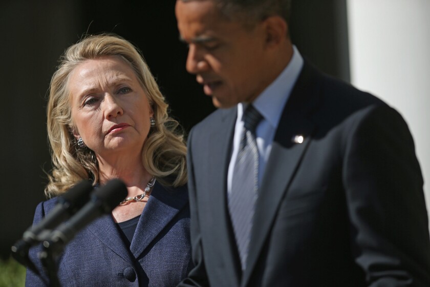 President Obama makes a statement about the death of U.S. ambassador to Libya J. Christopher Stevens with Secretary of State Hillary Rodham Clinton in the Rose Garden at the White House.