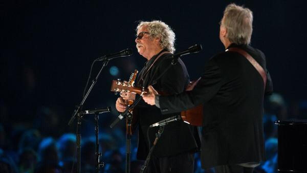 Chris Hillman, left, and Herb Pedersen shown performing in February for the Recording Academy's MusiCares Person of the Year salute to Tom Petty.