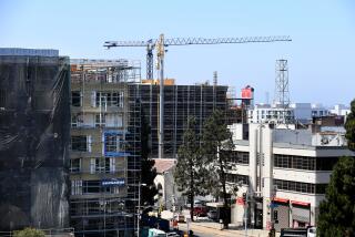 LOS ANGELES-CA-AUGUST 3, 2016: A building at the corner of 12th and Grand is under construction in downtown Los Angeles on Wednesday, August 3, 2016. (Christina House / For The Times)