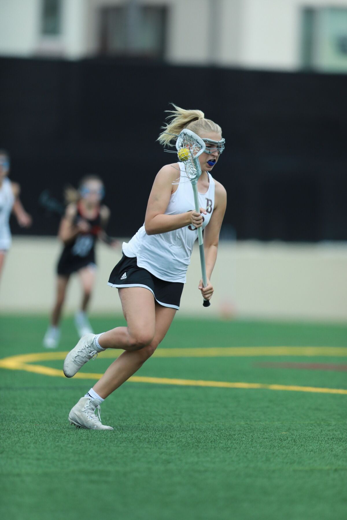 Bishop's School sophomore Erika Pfister is an athlete in three sports: lacrosse, field hockey and water polo.