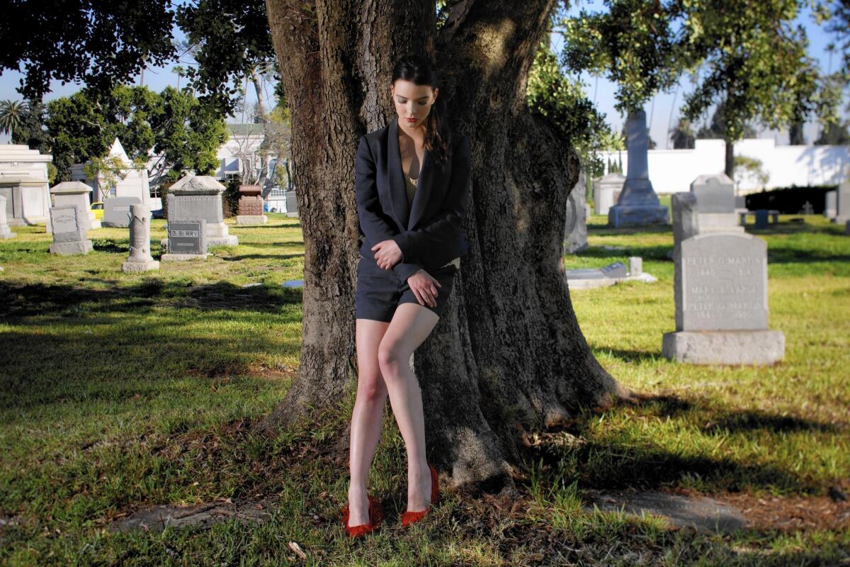 Anya Taylor-Joy, in the Hollywood Forever Cemetery above, says she was immersed in the world of 17th century New England for her enigmatic “Witch” role.