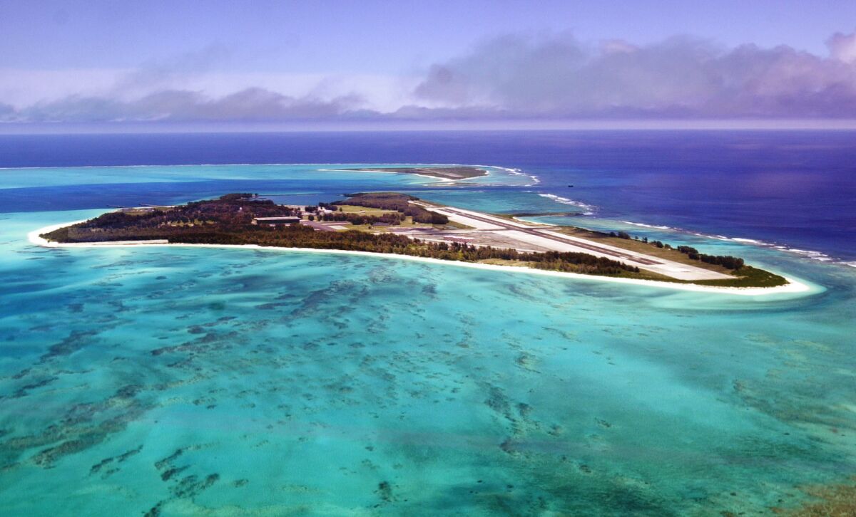 An aerial view of the 2.4-square-mile Midway Atoll. A United Airlines flight from Honolulu to Guam made an emergency landing at Midway after plane had mechanical issues.