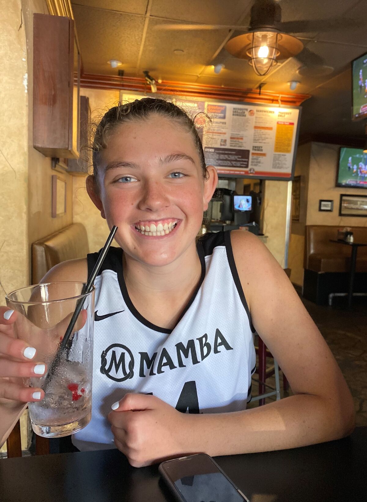 Payton Chester wears her Mamba basketball jersey.