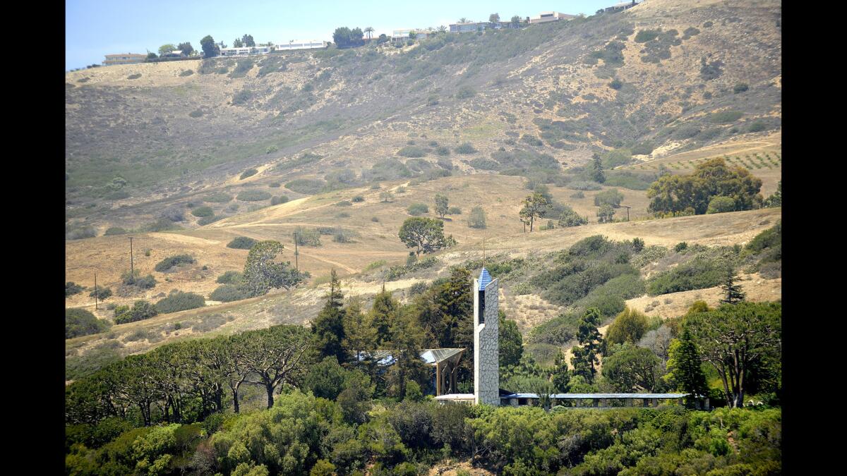 Wayfarers Chapel, designed by Lloyd Wright, is seen on an inland hill above Portuguese Point Loop Trail on the Palos Verdes Peninsula. The “Glass Chapel” is one of the South Coast’s premier wedding locations.