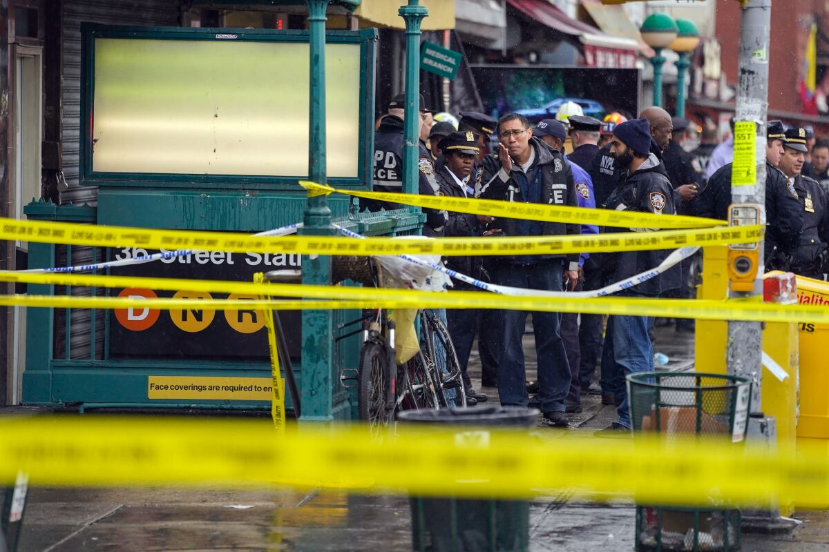 Police tape marks off the 36th Street Station in Brooklyn.