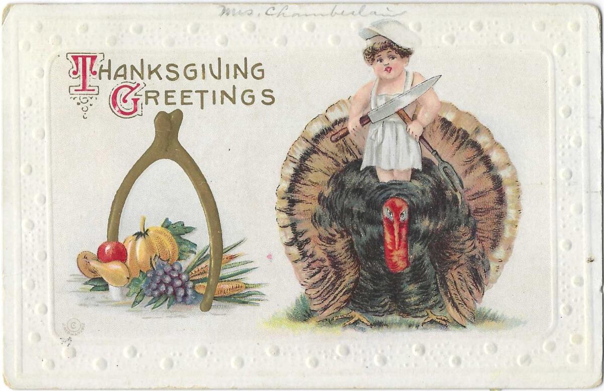 A chef with a huge knife stands atop a frowning turkey in this vintage postcard.