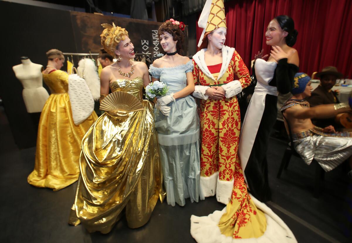 Cast members have a laugh backstage before the start of the Pageant of the Masters show.