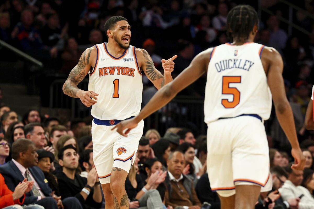 New York Knicks forward Obi Toppin (1) reacts to his shot with New York Knicks forward Obi Toppin (1) against the Toronto Raptors during the first half of an NBA basketball game, Sunday, April 10, 2022 in New York. (AP Photo/Jessie Alcheh)