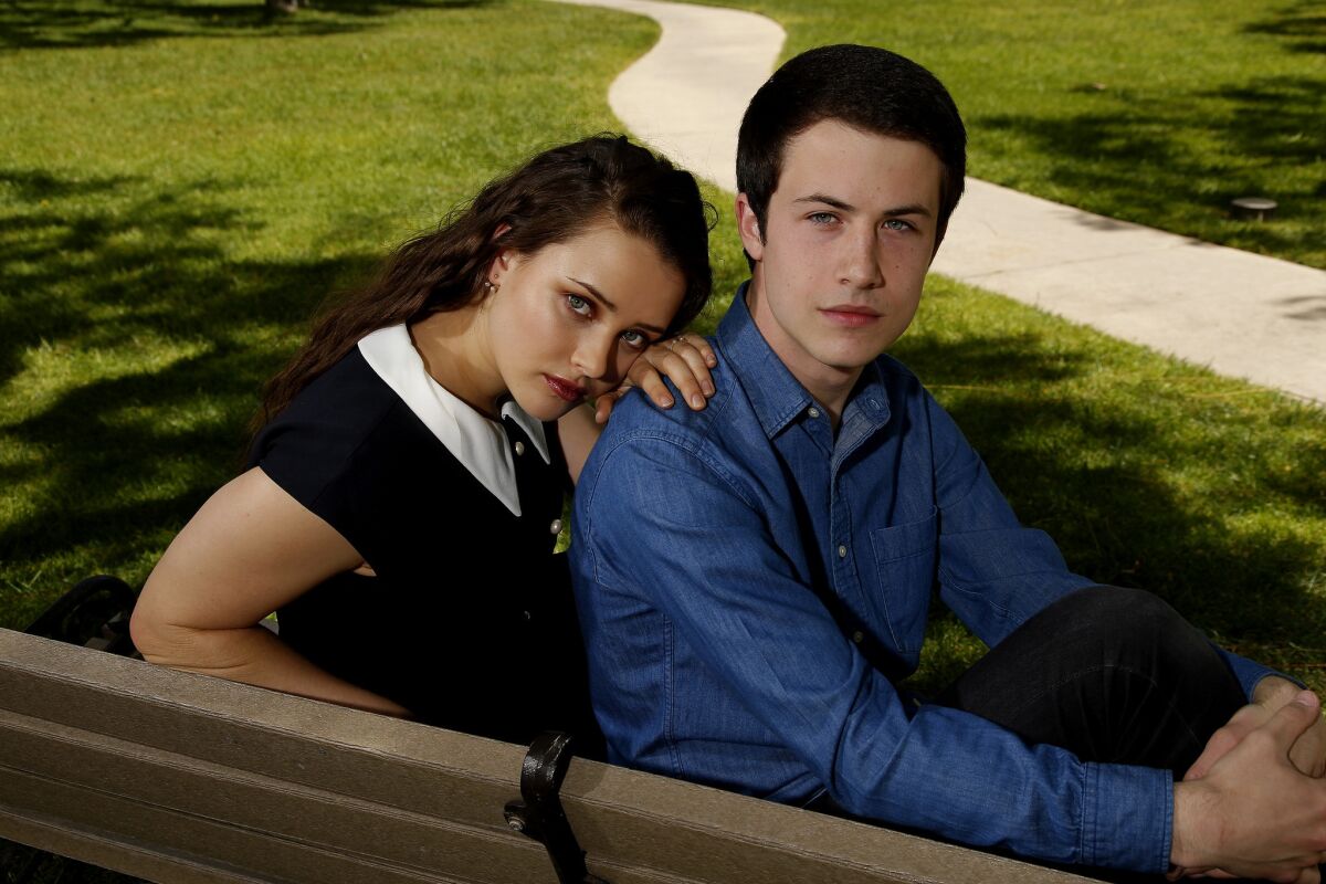 Katherine Langford, left, and Dylan Minnette, stars of Netflix's teen drama "13 Reasons Why."