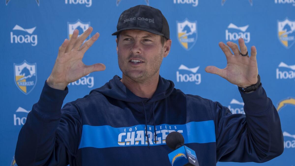 Philip Rivers discussed his contract among other things as the Chargers continued training at at Hoag Performance Center Field in Costa Mesa on Monday.