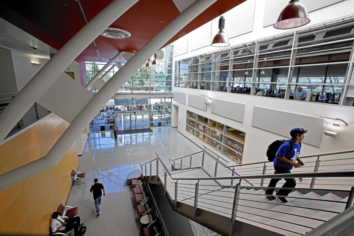 Compton Community College officials held a ribbon-cutting ceremony Tuesday for the new library, which opened last month. The 45,000-square-foot building includes a lab with 100 new computers.