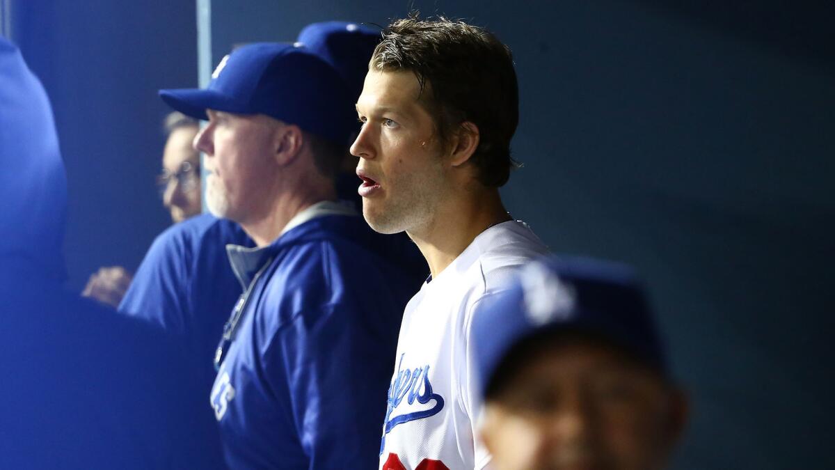 Dodgers starting pitcher Clayton Kershaw looks on from the dugout during a win over the Colorado Rockies on May 15.