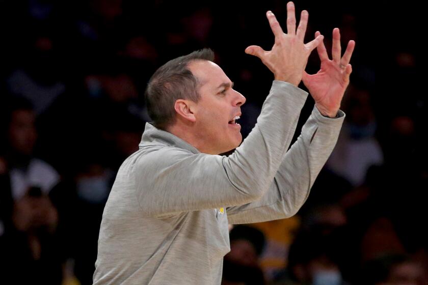 LOS ANGELES, CALIF. - DEC. 3, 2021. Lakers coach Frank Vogel yells instructions.