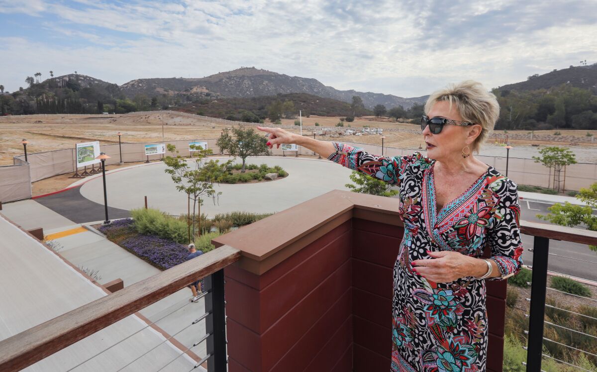 Cheryl Kilmer points out features on the now-underway 20-acre TERI Campus of Life in San Marcos.