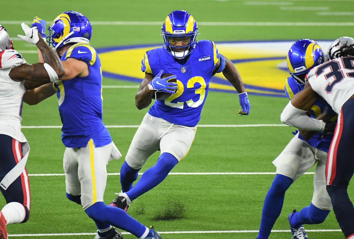 Rams running back Cam Akers picks up yards against the Patriots during a game in 2020.