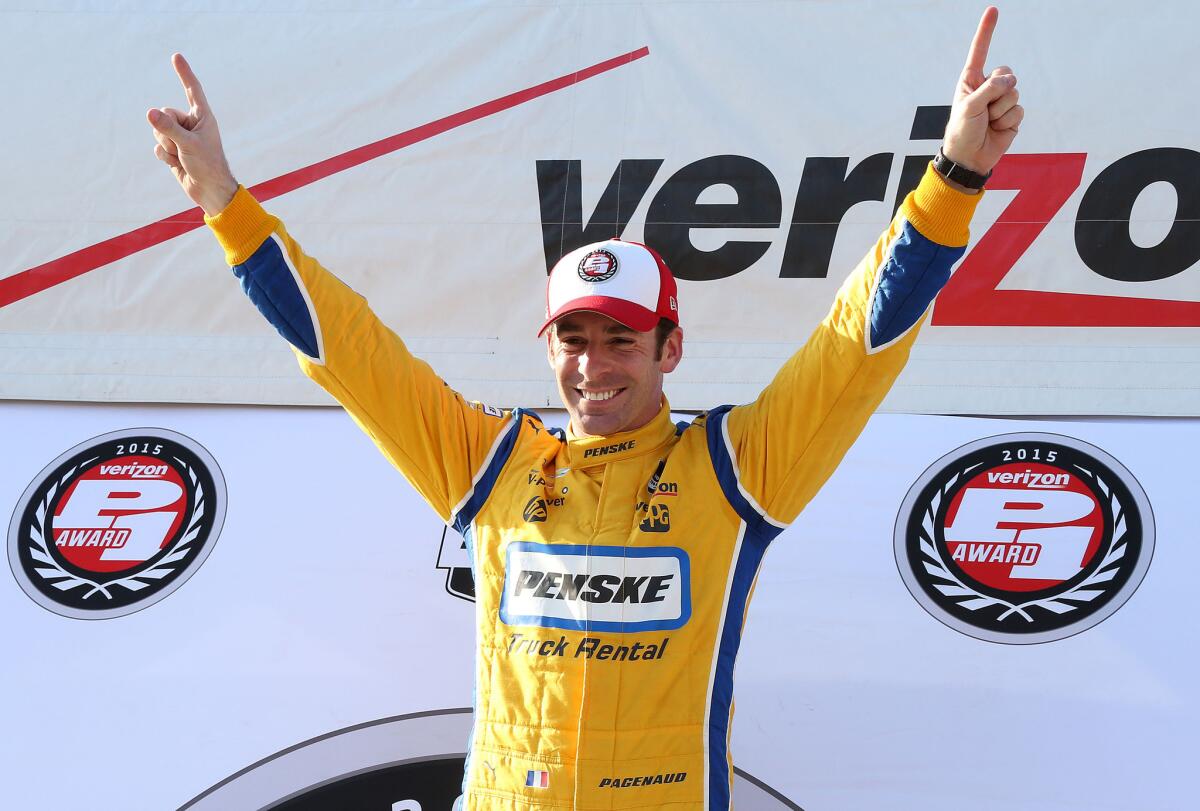 Simon Pagenaud celebrates Friday after winning pole position for the IndyCar race ths weekend at Auto Club Speedway.
