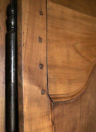 The square pegs in this 200-year-old armoire in the living room were used in place of glues.