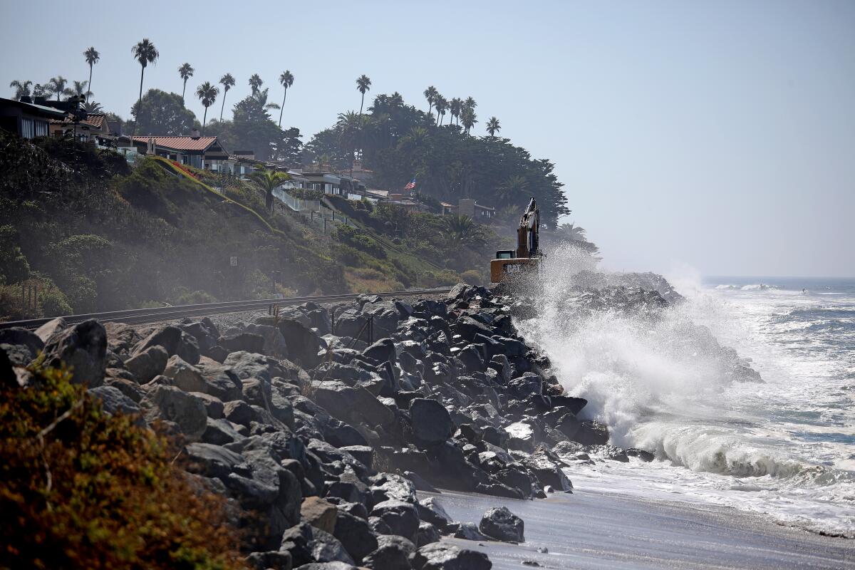 San Clemente's city manager stated that sand is the best way to protect a rail line hard armored with riprap.