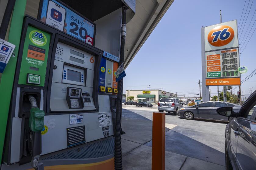 Los Angeles, CA - July 06: Lower Gas Prices shown on Gas Boards in Los Angeles, CA. (Zoe Cranfill / Los Angeles Times)