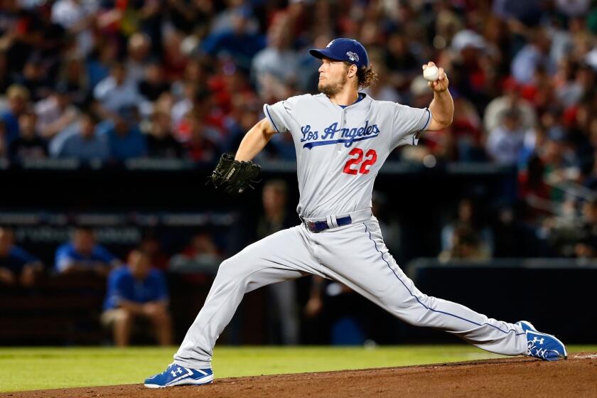 Dodgers starter Clayton Kershaw delivers a pitch against the Atlanta Braves in Game 1 of the National League division series on Thursday.