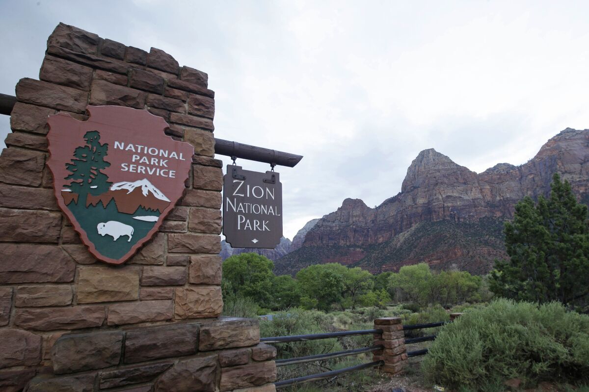 FILE - This Sept. 15, 2015, file photo, shows Zion National Park near Springdale, Utah. Zion National Park will soon require reservations to hike the famous southern Utah trail, known as Angel's Landing. perched on the edge of a red-rock cliff, officials said Friday , Dec. 3, 2021. (AP Photo/Rick Bowmer, File)