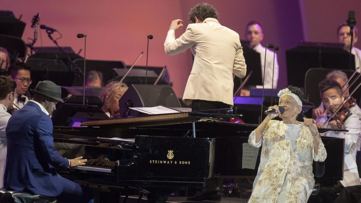 Cuban singer Omara Portuondo performs with the Los Angeles Philharmonic and Music Director Gustavo Dudamel plus pianist Roberto Fonseca at the Hollywood Bowl on Tuesday.