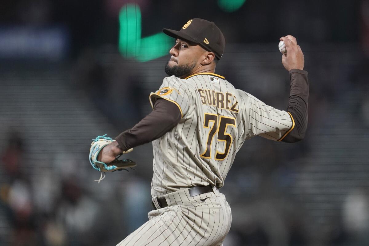 San Diego's Robert Suarez delivers against the San Francisco Giants on Aug. 29.