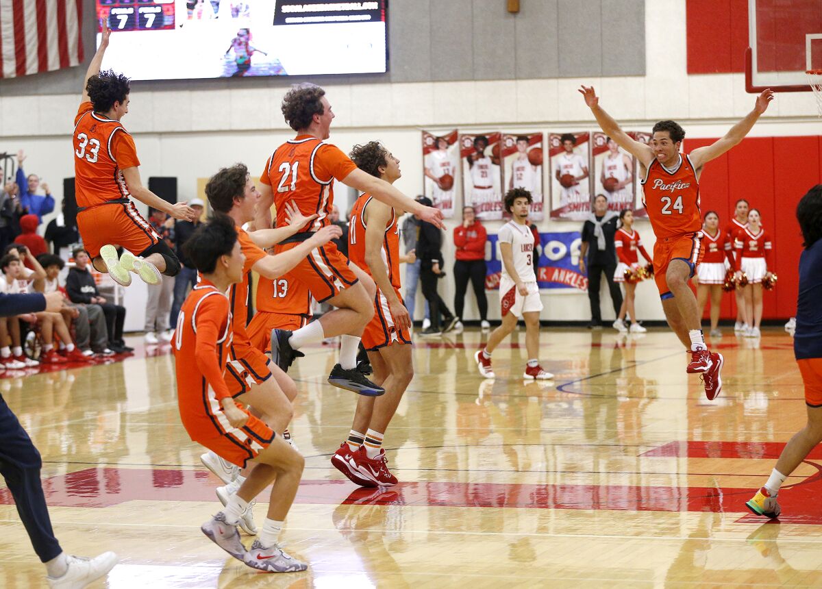 Pacifica Christian Orange County players celebrate after beating Orange Lutheran on Tuesday night.
