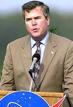 Then-Florida Gov. Jeb Bush addresses NASA employees during a memorial service after the crash of the space shuttle Columbia in 2003.