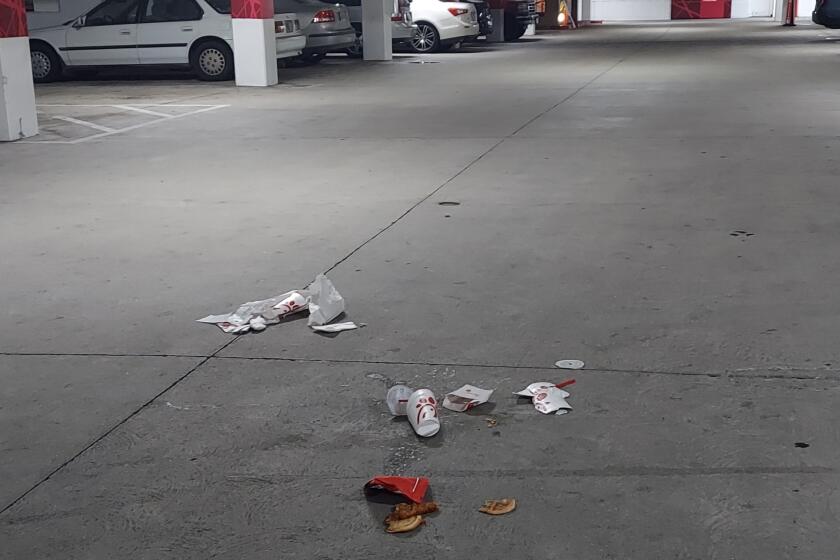 A reader noticed and later cleaned up a fast-food dinner discarded at a parking structure.