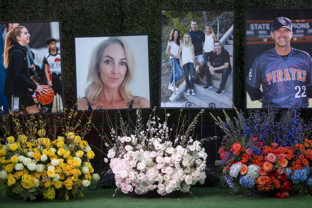 Photos outside Angel Stadium honor the lives of, from left to right, Alyssa, Keri and John Altobelli.