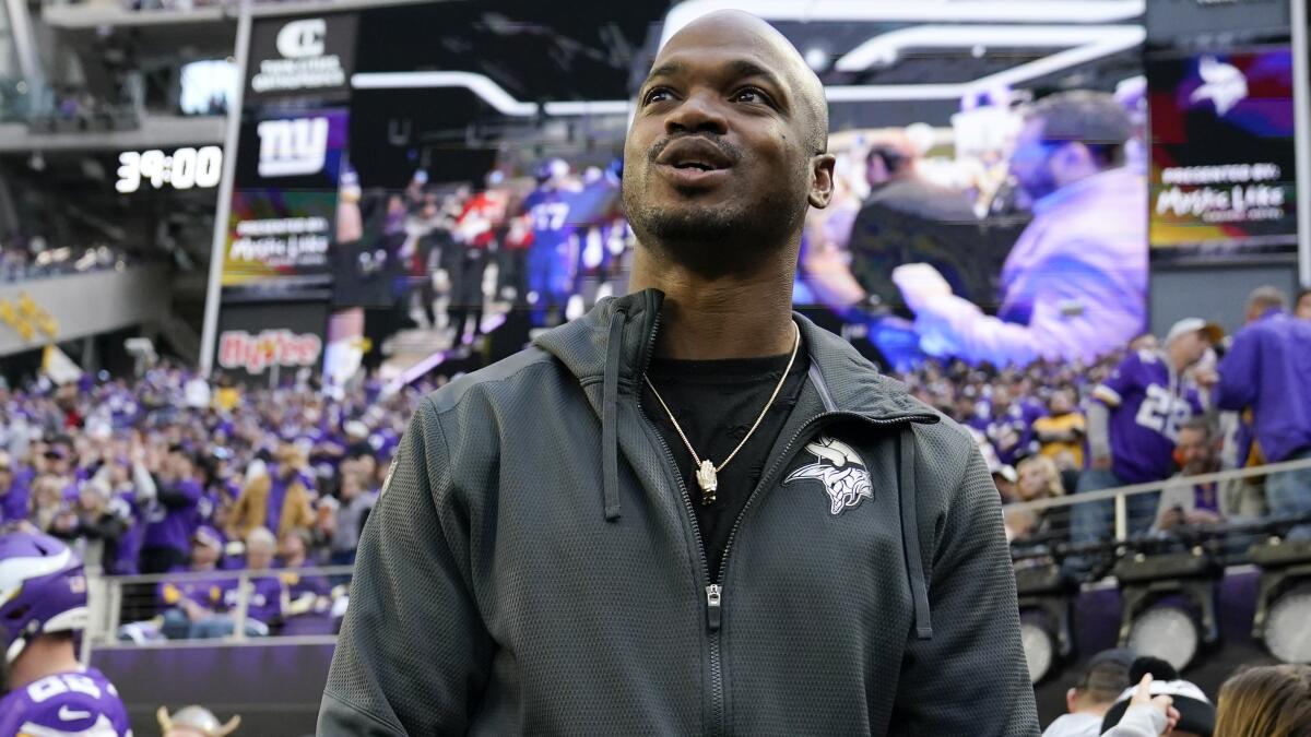 Vikings aren't phasing out Adrian Peterson – yet