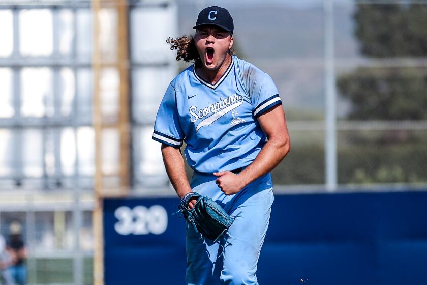 Boston Bateman of Camarillo gets excited after a fourth-inning strikeout with the bases loaded against Dos Pueblos.