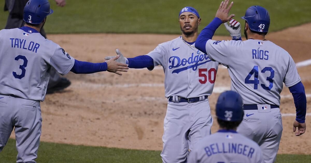 Homers by Smith, Turner help Dodgers rout winless A's 10-3