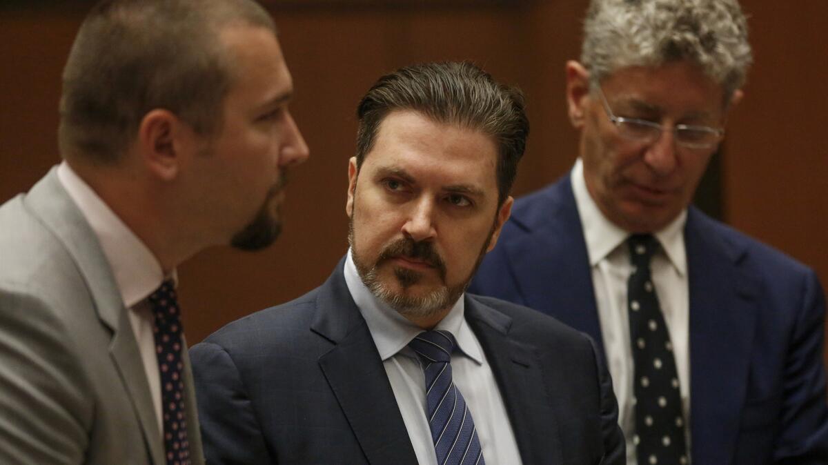 Defendant Pasquale Rotella, center, one of two concert promoters that will avoid serving jail time.