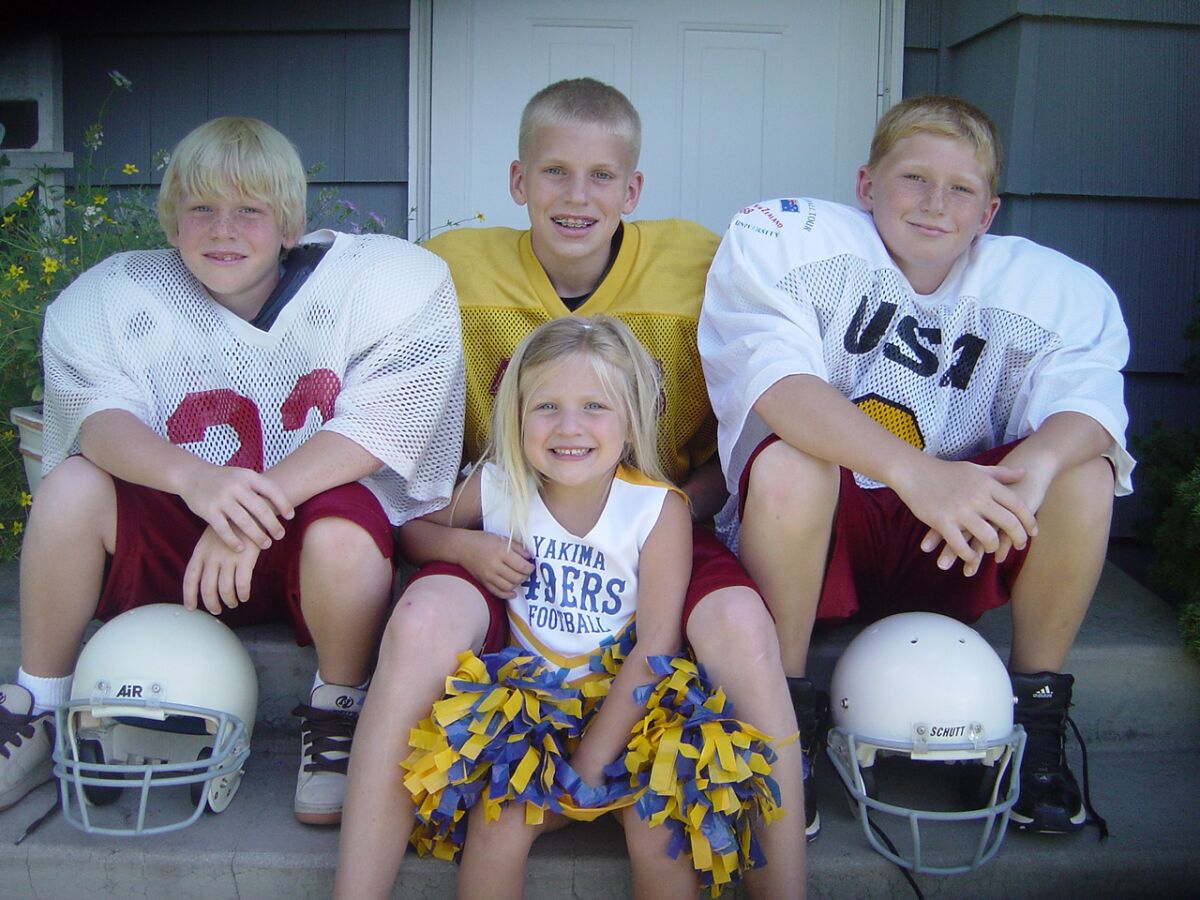 Cooper Kupp, top center, sits with siblings (from left) Kobe, Katrina and Ketner in the early 2000s.