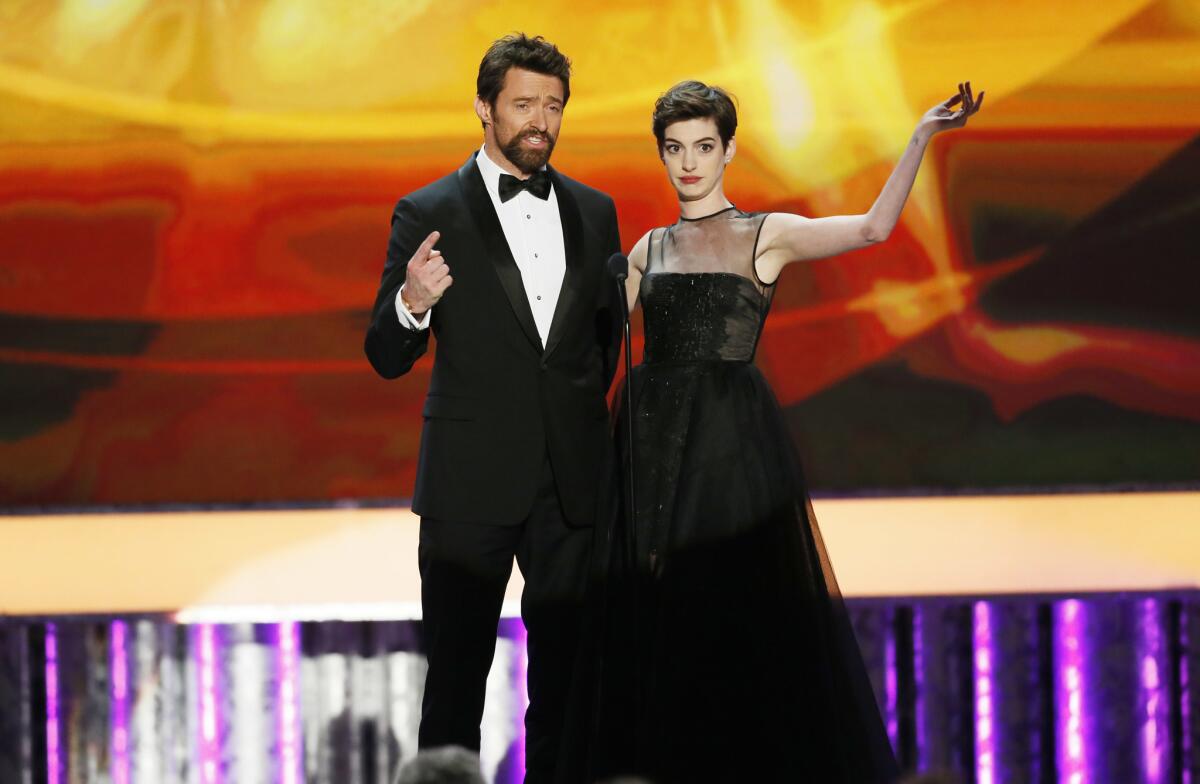 Hugh Jackman and Anne Hathaway at the Screen Actors Guild Awards on Jan. 27, 2013. The pair will reunite at a fundraiser for Hillary Clinton on Monday.