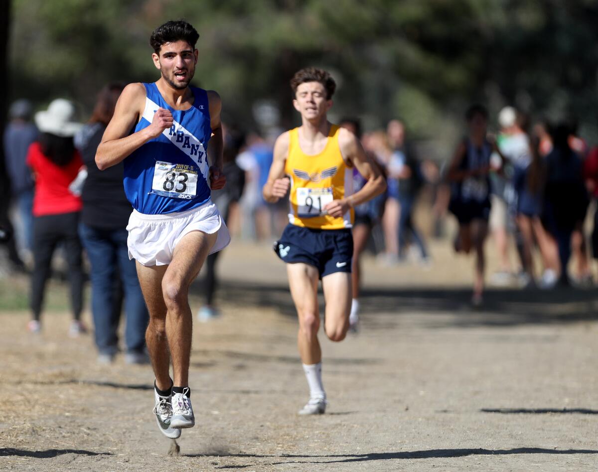 Burbank senior Victor Goli ran in the boys division 1 CIF Southern Section Cross Country Finals, at Riverside City Cross-Country Course in Riverside on Saturday, Nov. 23, 2019.
