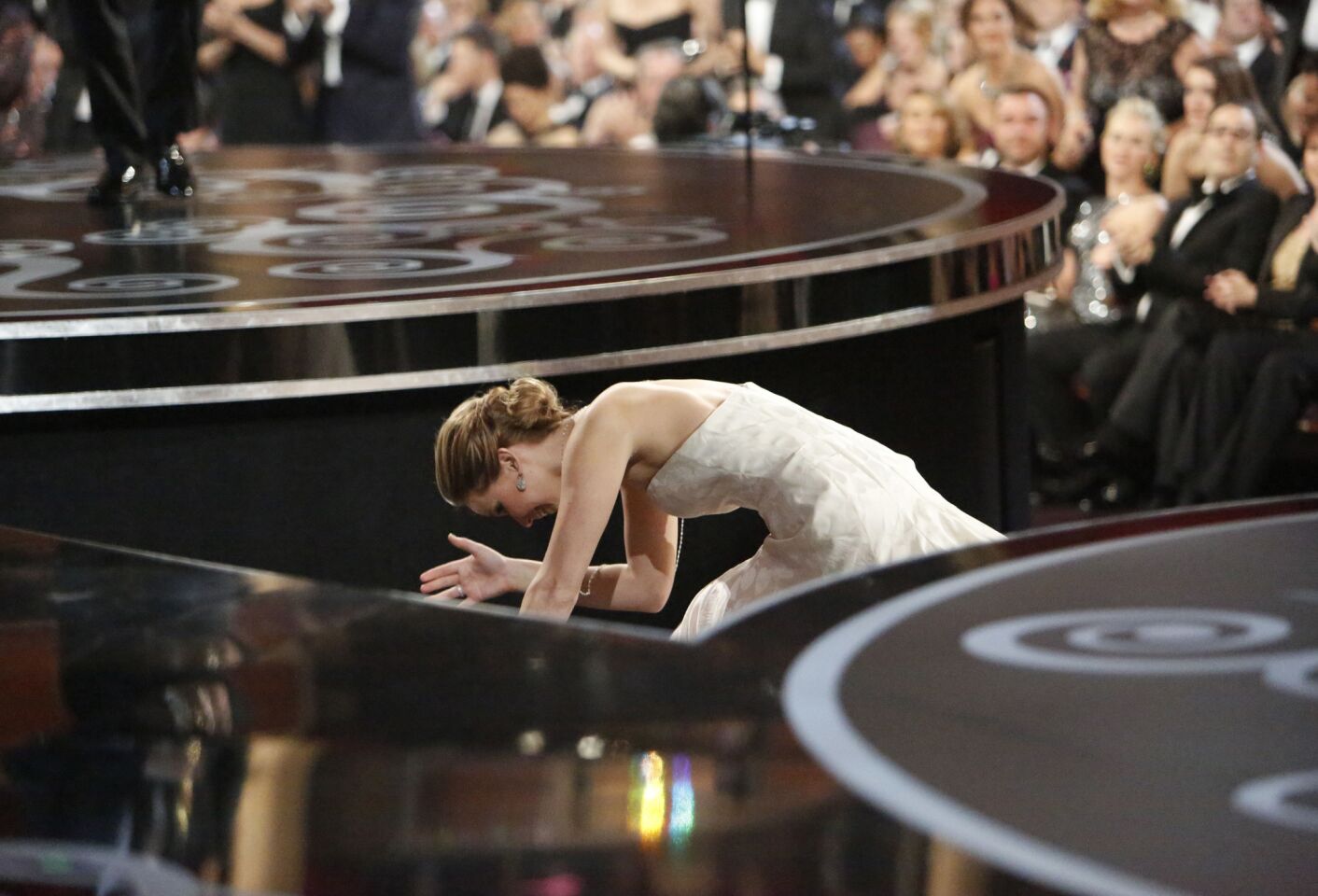 Could we crown Jennifer Lawrence the queen of adorable award fumbles? There was her tumble to accept the award for best actress at the 2013 Oscars, pictured. And then there was the more unfortunate ripping of her dress at the 2013 SAG Awards. Or was it a rip? While viewers adamantly believed it was, Lawrence actually just pulled up the top part of her dress to reveal the sheer lining in between that and the skirt.