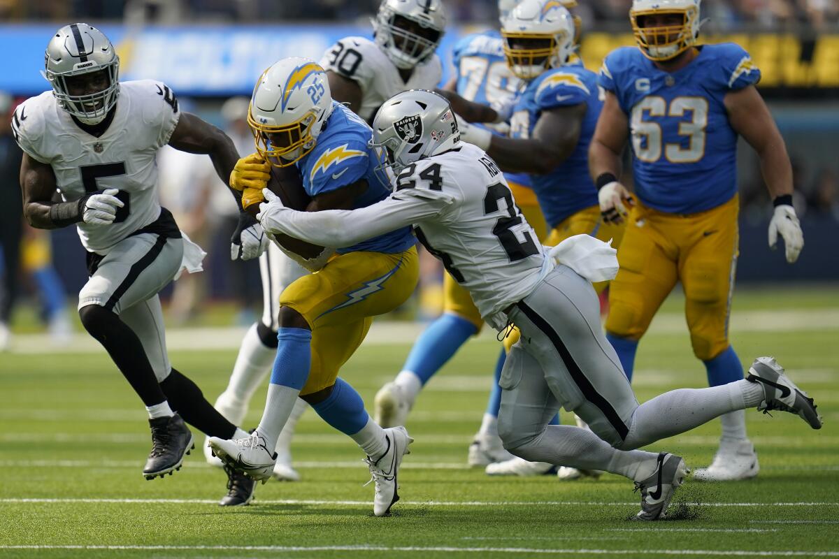 Chargers running back Joshua Kelley runs against the Las Vegas Raiders.