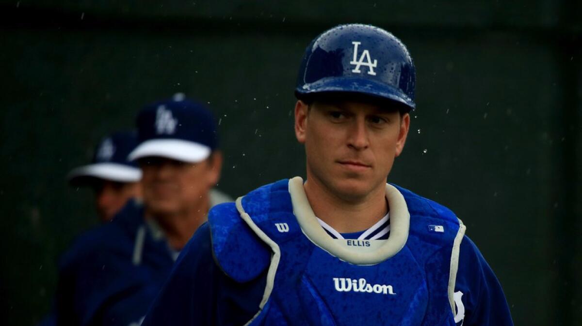 Catcher A.J. Ellis works out on a rainy day at Dodgers spring training in 2015. He was traded to the Philadelphia Phillies on Thursday.