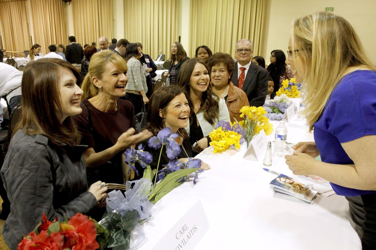 Fans met with inspirational speaker and actress Charlene Tilton after the 51st annual Glendale Mayor's Prayer Breakfast held at the Glendale Civic Auditorium on Thursday, March 13, 2014. (