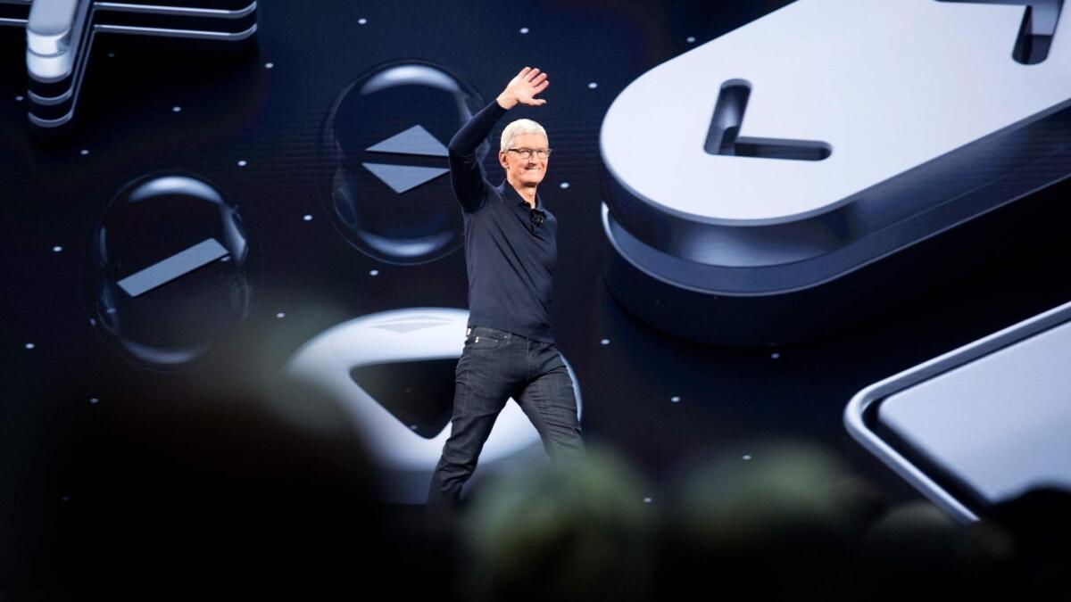 Apple Chief Executive Tim Cook takes the stage during Apple's Worldwide Developer Conference at the San Jose Convention Center in June. Apple is planning a 3D-based augmented-reality camera for iPhones in 2020 and has a team of engineers working on an AR headset.