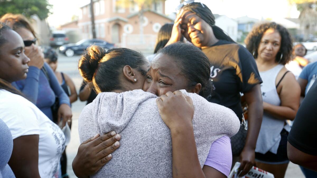 Prescious Sasser, mother of 18-year-old Kenney Watkins, at a prayer vigil in South Los Angeles. Watkins was shot and killed by an LAPD officer on Aug. 16, 2016.